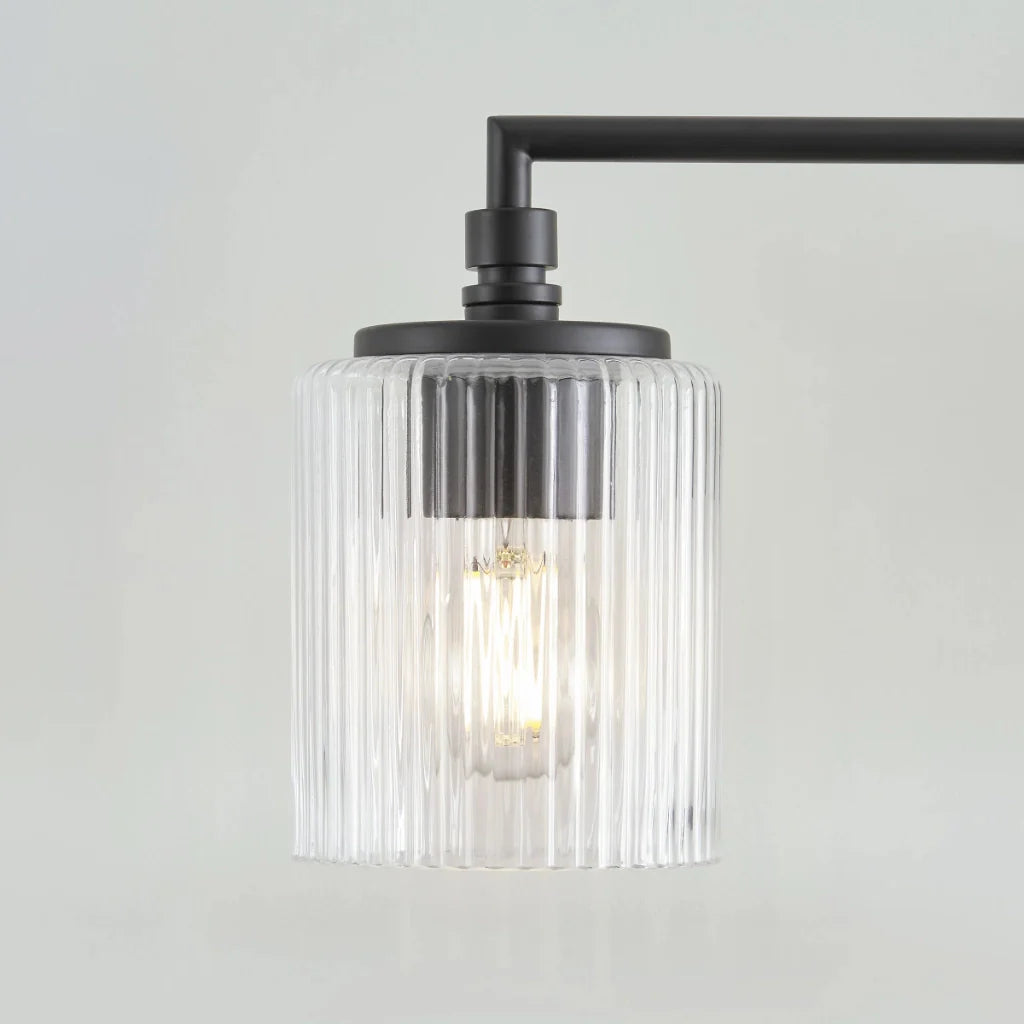 Eliot_Modern_3-Light_Ribbed_Glass_Cylinder_Vanity_Wall_Lamp-xj2.webp__PID:29708bc9-7fbe-4c45-8c8a-ae626e03efda