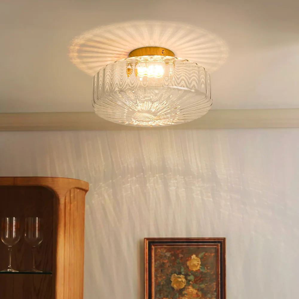 Rowena moderne ronde geribbelde glazen plafondlamp van messing (1).webp__PID:131c08c0-b0d1-4e8f-ae80-3e34aa28edad