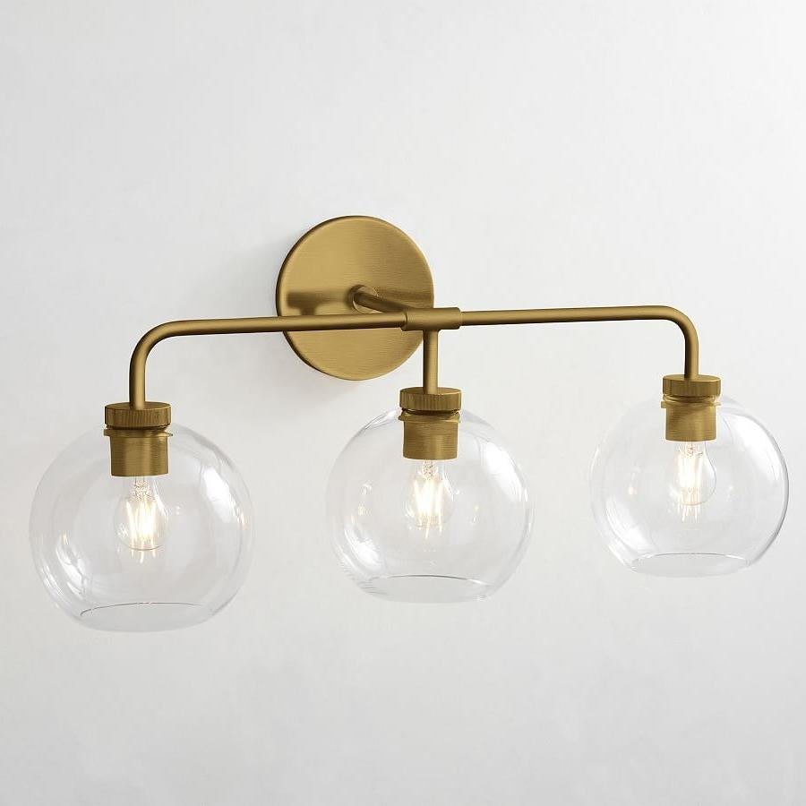 Aplique de pared Kaia de vidrio con triple globo, moderno, de latón.webp__PID:62dde01a-e049-4ba1-9dc2-6210083f9935