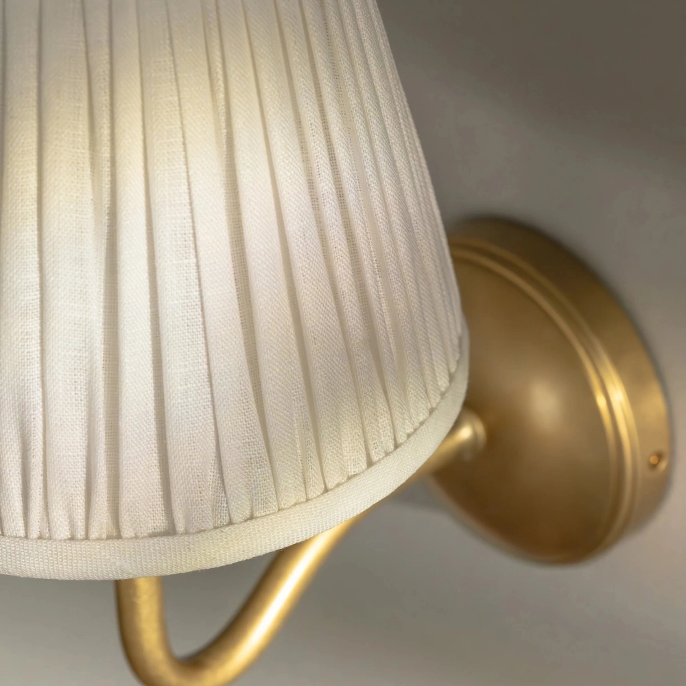 Finn Pleated Shade Brass Arm Wall Sconce1.webp__PID:d578378a-8209-491f-8a46-f0e6cedd9b95