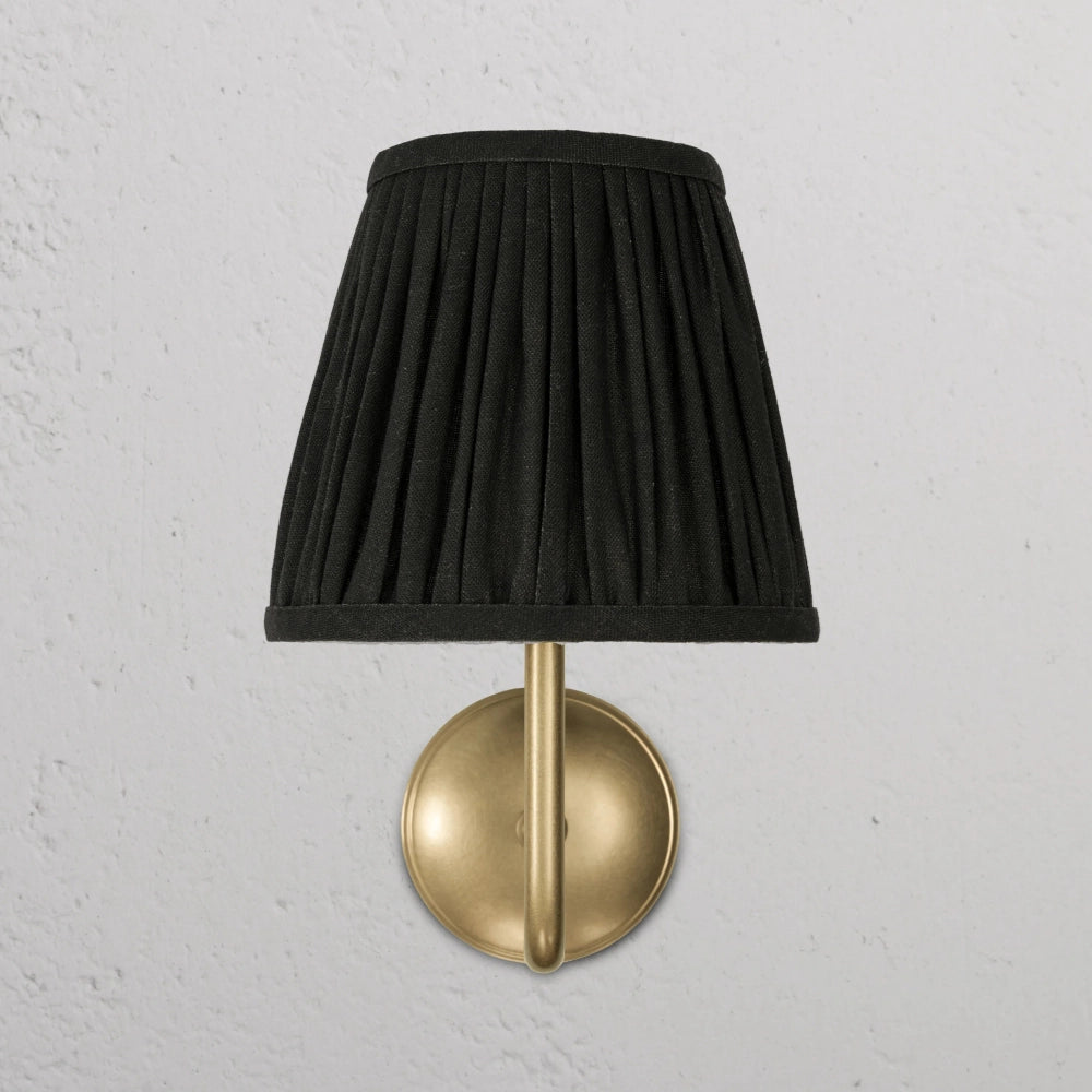 Finn Pleated Shade Brass Arm Wall Sconce3.webp__PID:8a8209f9-1f8a-46f0-a6ce-dd9b956da439